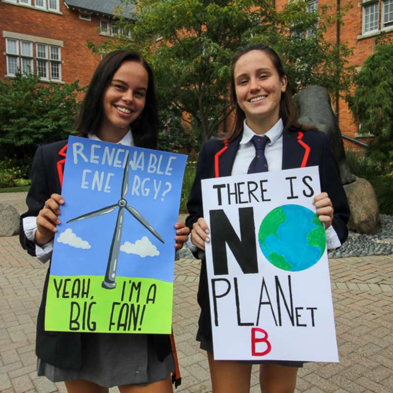 Two sutdentd advocating for a greener planet