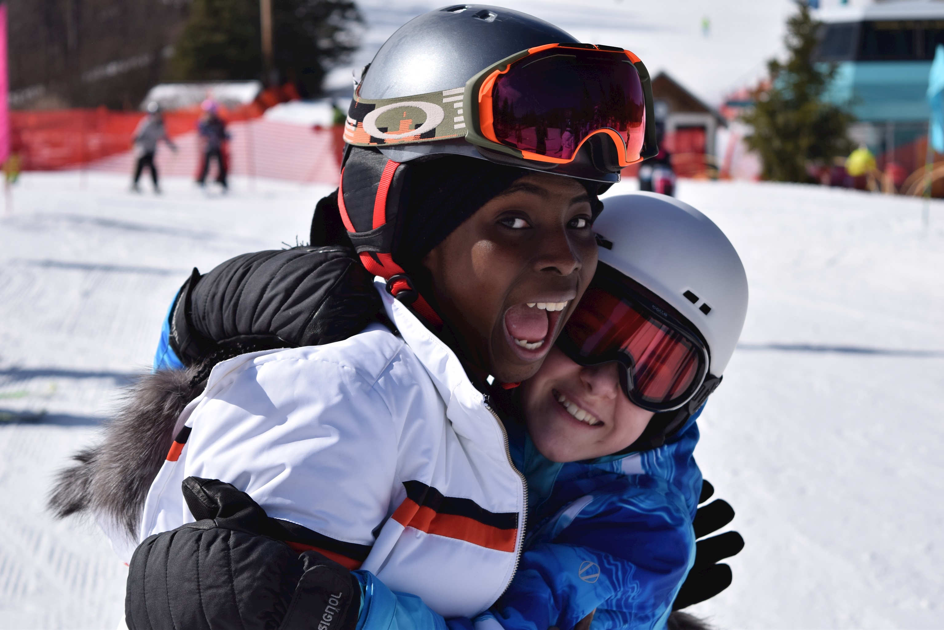 Photo of two students after skiiing